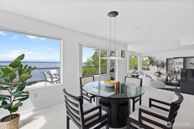 dining area with a water view
