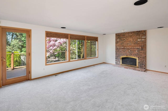 23812 21st Dr SE, Bothell, WA 98021 - unfurnished living room featuring carpet floors, baseboards, a brick fireplace, and visible vents