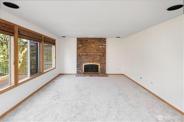 23812 21st Dr SE, Bothell, WA 98021 - unfurnished living room with carpet flooring, baseboards, and a fireplace