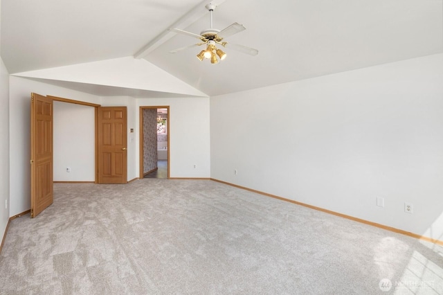 23812 21st Dr SE, Bothell, WA 98021 - unfurnished bedroom with baseboards, ceiling fan, vaulted ceiling with beams, and light colored carpet