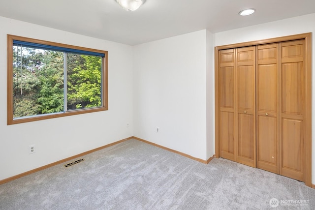 23812 21st Dr SE, Bothell, WA 98021 - unfurnished bedroom featuring carpet floors, visible vents, a closet, baseboards, and recessed lighting