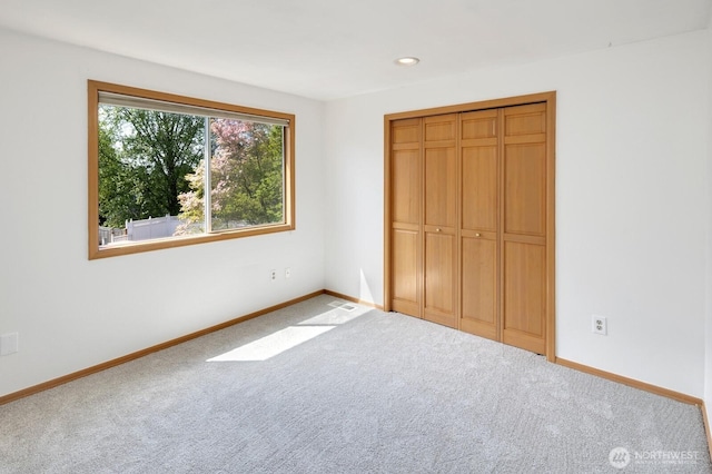 23812 21st Dr SE, Bothell, WA 98021 - unfurnished bedroom featuring baseboards, carpet, a closet, and recessed lighting