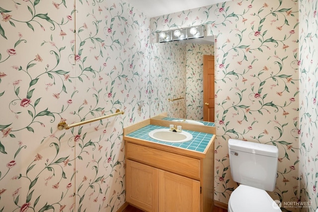 23812 21st Dr SE, Bothell, WA 98021 - bathroom featuring toilet, wallpapered walls, and vanity