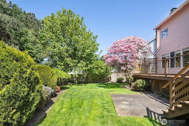 23812 21st Dr SE, Bothell, WA 98021 - view of yard with a fenced backyard, a wooden deck, stairs, and a patio