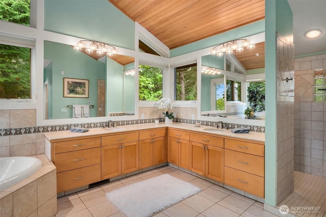 full bathroom featuring double vanity, a sink, wood ceiling, and vaulted ceiling