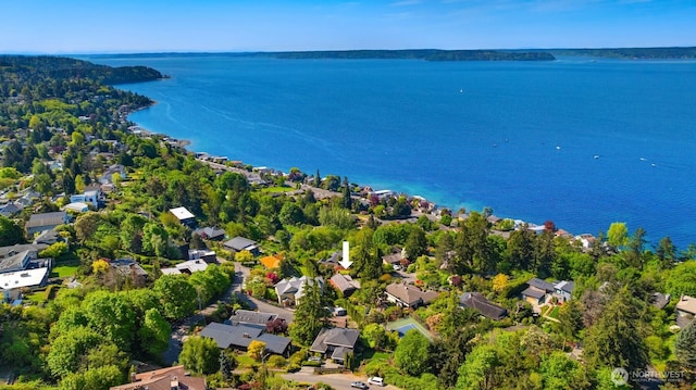 birds eye view of property with a water view and a residential view