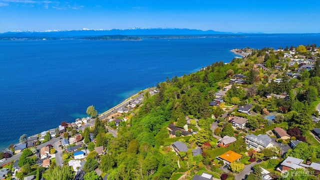 bird's eye view with a residential view and a water and mountain view