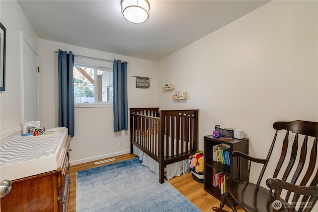6160 NE 185th St, Kenmore, WA 98028 - bedroom with wood finished floors and baseboards