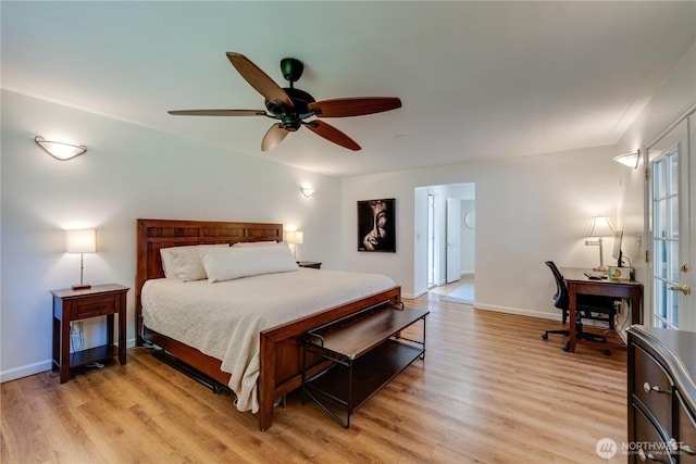 6160 NE 185th St, Kenmore, WA 98028 - bedroom with light wood-type flooring, baseboards, ceiling fan, and a desk