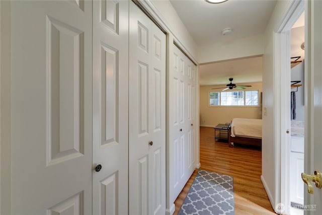 6160 NE 185th St, Kenmore, WA 98028 - hallway featuring light wood finished floors and baseboards