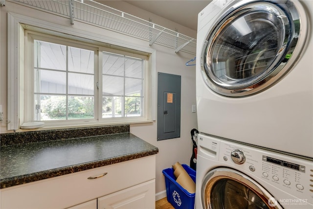 6160 NE 185th St, Kenmore, WA 98028 - laundry room with estacked washer and dryer and electric panel