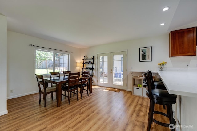 6160 NE 185th St, Kenmore, WA 98028 - dining area with french doors, healthy amount of natural light, light wood-style flooring, and recessed lighting