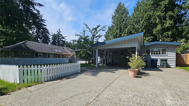 6160 NE 185th St, Kenmore, WA 98028 - view of property exterior with driveway and a carport