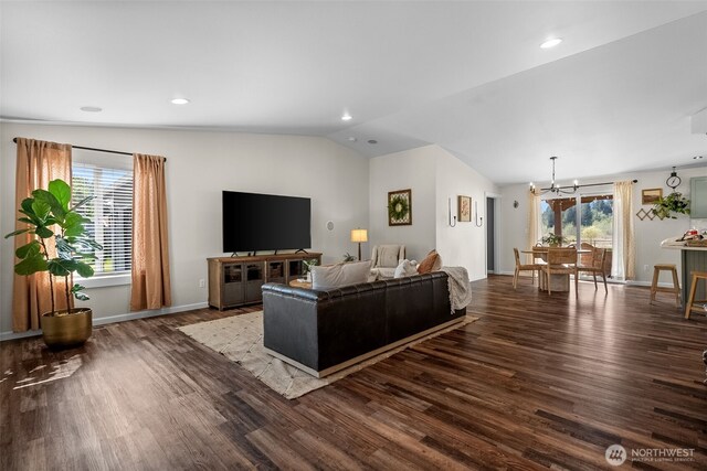 living area featuring wood finished floors, baseboards, recessed lighting, a chandelier, and vaulted ceiling