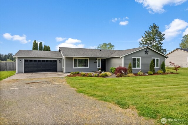 single story home with fence, a front yard, roof with shingles, concrete driveway, and an attached garage