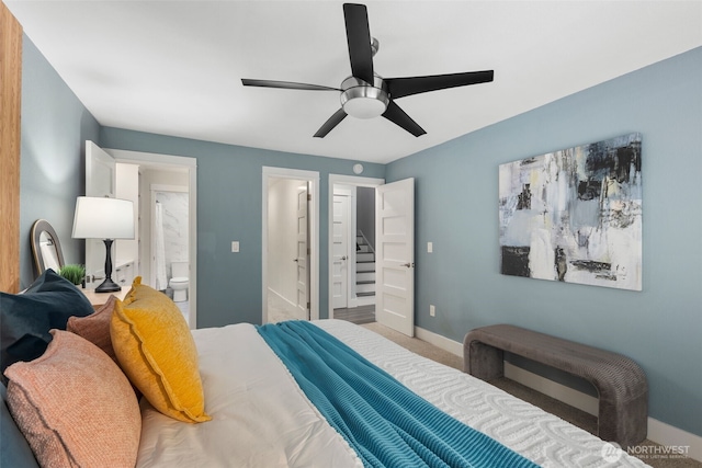 6540 159th Ave NE, Redmond, WA 98052 - carpeted bedroom with baseboards, connected bathroom, and ceiling fan