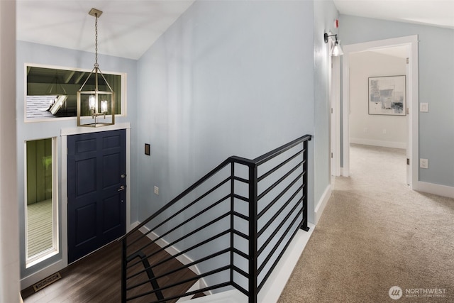6540 159th Ave NE, Redmond, WA 98052 - entryway with an inviting chandelier, baseboards, carpet floors, and lofted ceiling