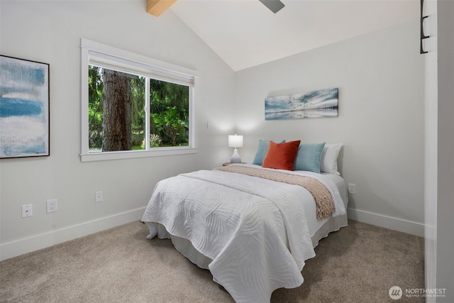 6540 159th Ave NE, Redmond, WA 98052 - carpeted bedroom with baseboards and lofted ceiling with beams