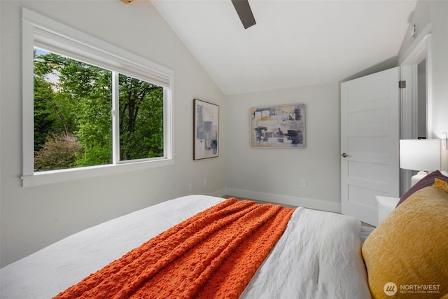 6540 159th Ave NE, Redmond, WA 98052 - bedroom featuring baseboards, a ceiling fan, and vaulted ceiling