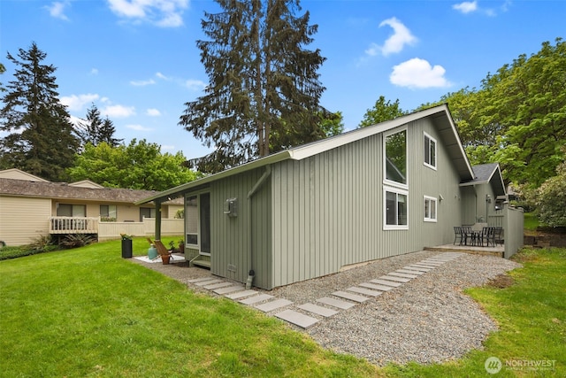 6540 159th Ave NE, Redmond, WA 98052 - back of property featuring a patio, board and batten siding, and a yard