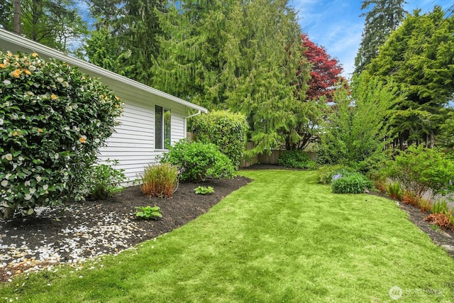 view of yard with fence
