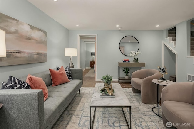 living room with recessed lighting and stairway