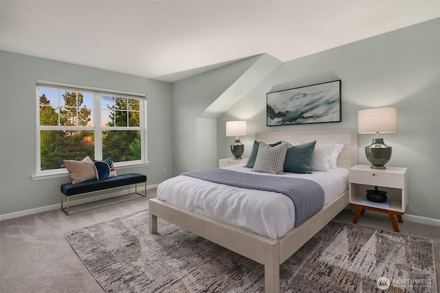 bedroom with carpet floors and baseboards