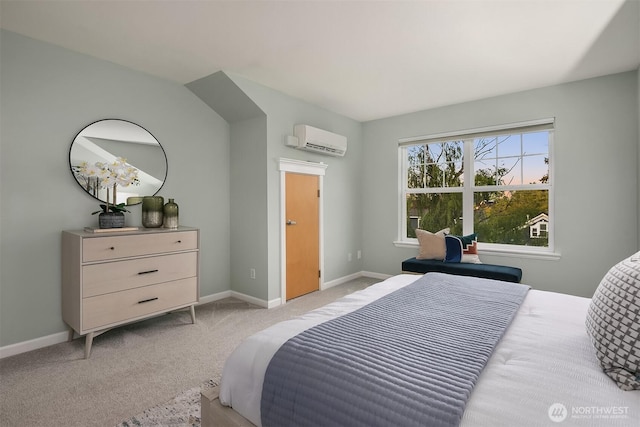 bedroom with a wall mounted air conditioner, light carpet, and baseboards
