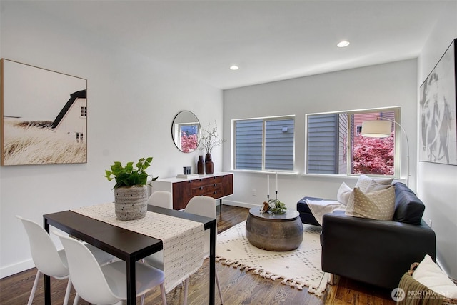 dining area with baseboards, recessed lighting, and wood finished floors