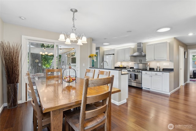 15825 10th Ave SW, Burien, WA 98166 - dining area featuring a chandelier, dark wood-style floors, baseboards, and recessed lighting