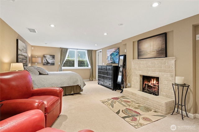 15825 10th Ave SW, Burien, WA 98166 - bedroom featuring light colored carpet, a fireplace, recessed lighting, and baseboards