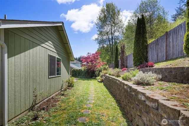 view of yard with fence