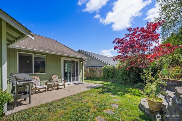 view of yard with a patio area and fence