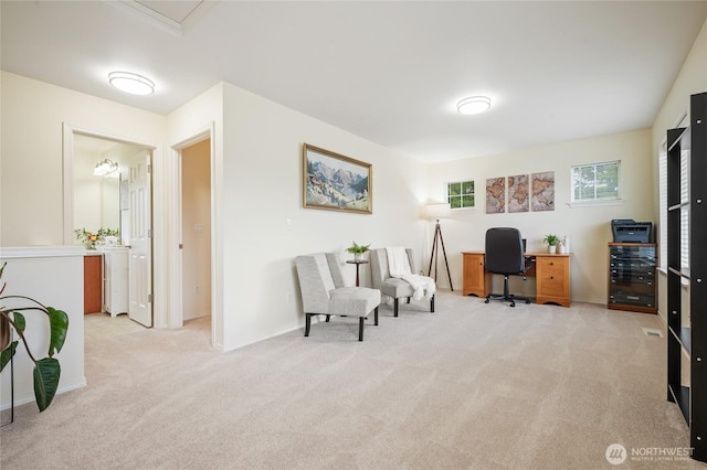 carpeted office with baseboards