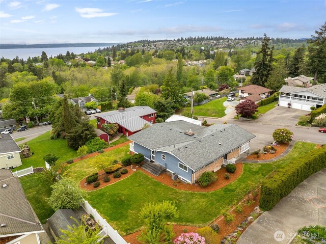 aerial view with a residential view and a water view