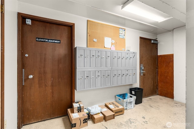 1156 Alki Ave SW Unit 401, Seattle, WA 98116 - interior space with concrete flooring and mail area