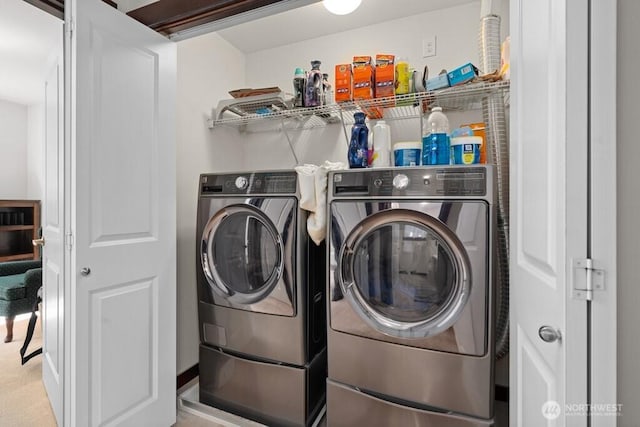 laundry area featuring independent washer and dryer and laundry area