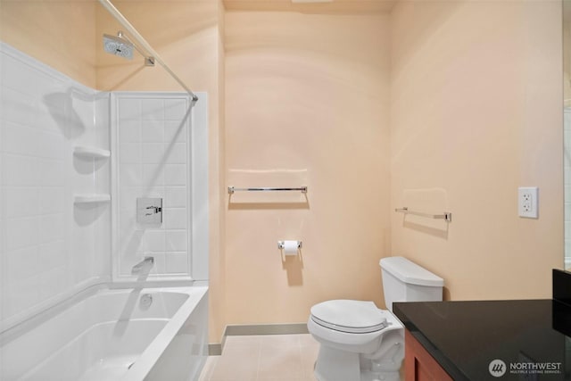 bathroom with tile patterned floors, toilet, vanity, and bathtub / shower combination