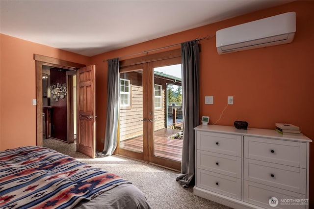 166 White Point Rd, Friday Harbor, WA 98250 - carpeted bedroom featuring a wall mounted air conditioner, access to outside, and french doors