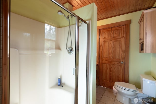 166 White Point Rd, Friday Harbor, WA 98250 - full bathroom with a stall shower, tile patterned flooring, wood ceiling, and toilet