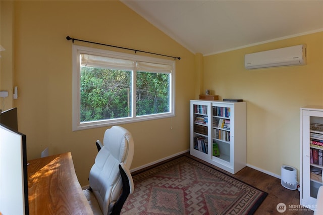 166 White Point Rd, Friday Harbor, WA 98250 - office with a wall unit AC, vaulted ceiling, wood finished floors, and baseboards