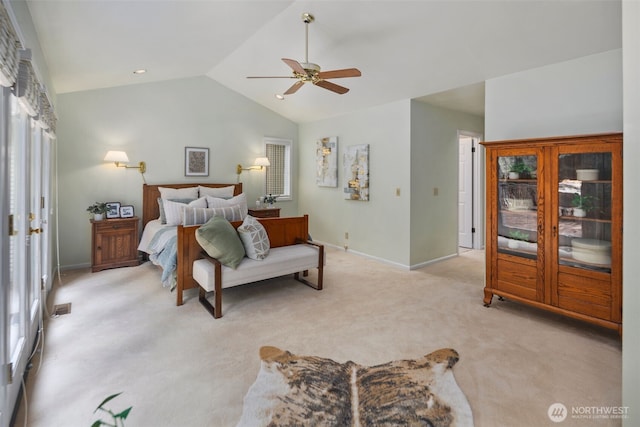bedroom with baseboards, visible vents, lofted ceiling, and light colored carpet