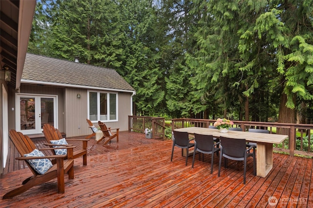 deck featuring french doors and outdoor dining space