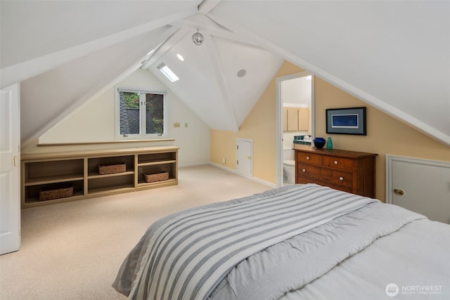 carpeted bedroom with baseboards and vaulted ceiling