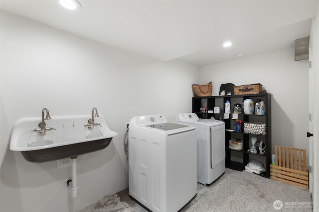 laundry room featuring a sink, laundry area, recessed lighting, and washing machine and clothes dryer
