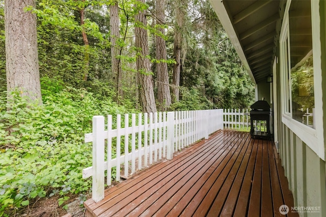 wooden deck with area for grilling