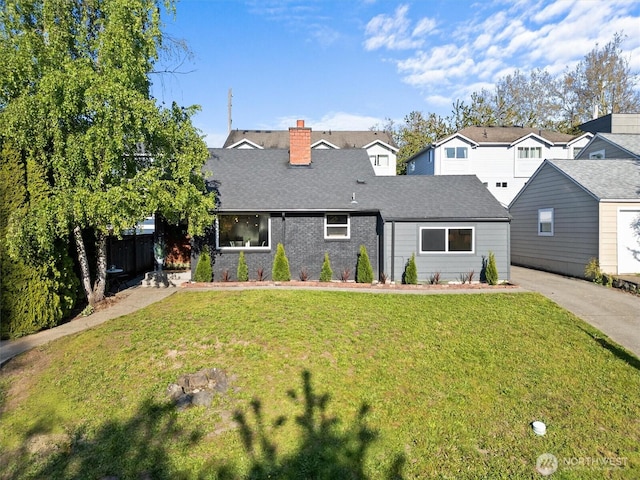 6534 34th Ave SW, Seattle, WA 98126 - view of front of property with roof with shingles, a chimney, and a front lawn