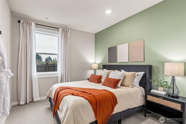 carpeted bedroom with recessed lighting, baseboards, and visible vents