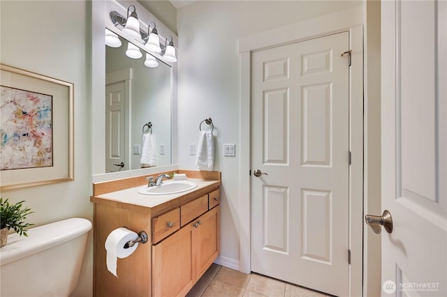 6722 Azalea Way SE, Snoqualmie, WA 98065 - half bath featuring vanity, tile patterned floors, and toilet