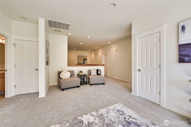 6722 Azalea Way SE, Snoqualmie, WA 98065 - sitting room with carpet floors, baseboards, and recessed lighting
